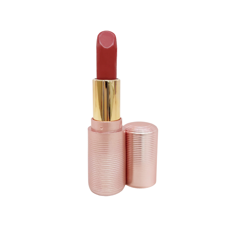 Lex and Jong Lip Rouge lipstick in Spanish Red - a deep, burnt spicy red shade. Rose gold fluted lipstick packaging